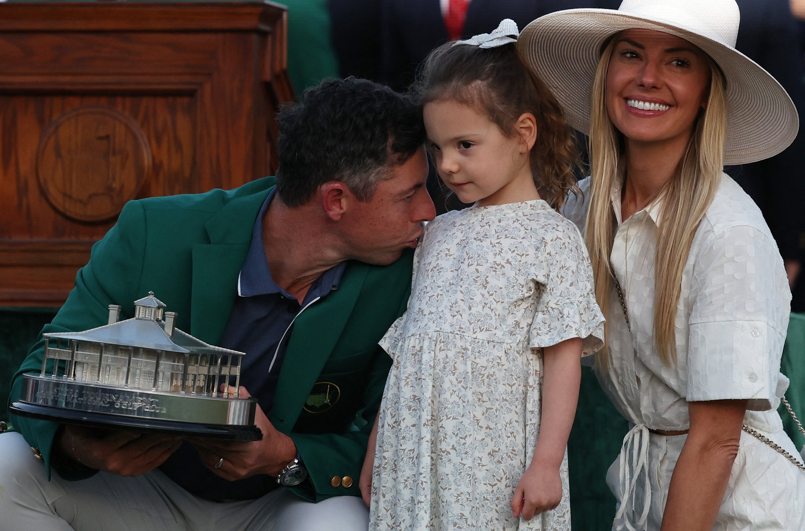 Rory with daughter Poppy and wife Erica
